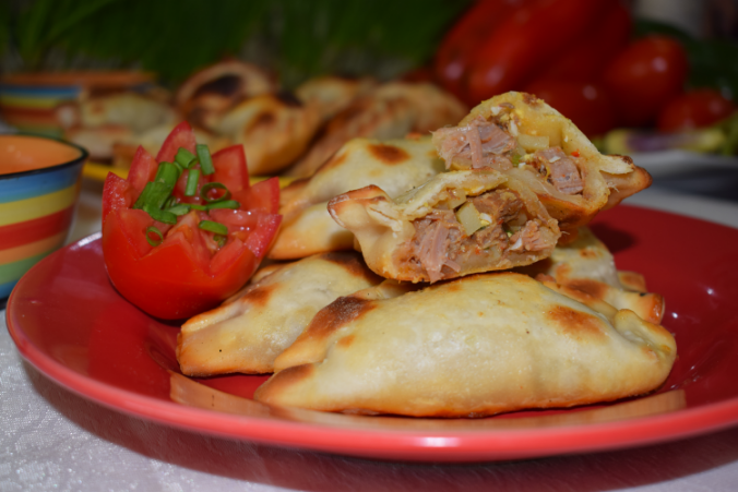 Imagen de empandas sabrosas en un plato